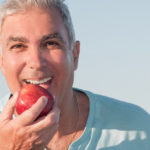 Man Eating Apple